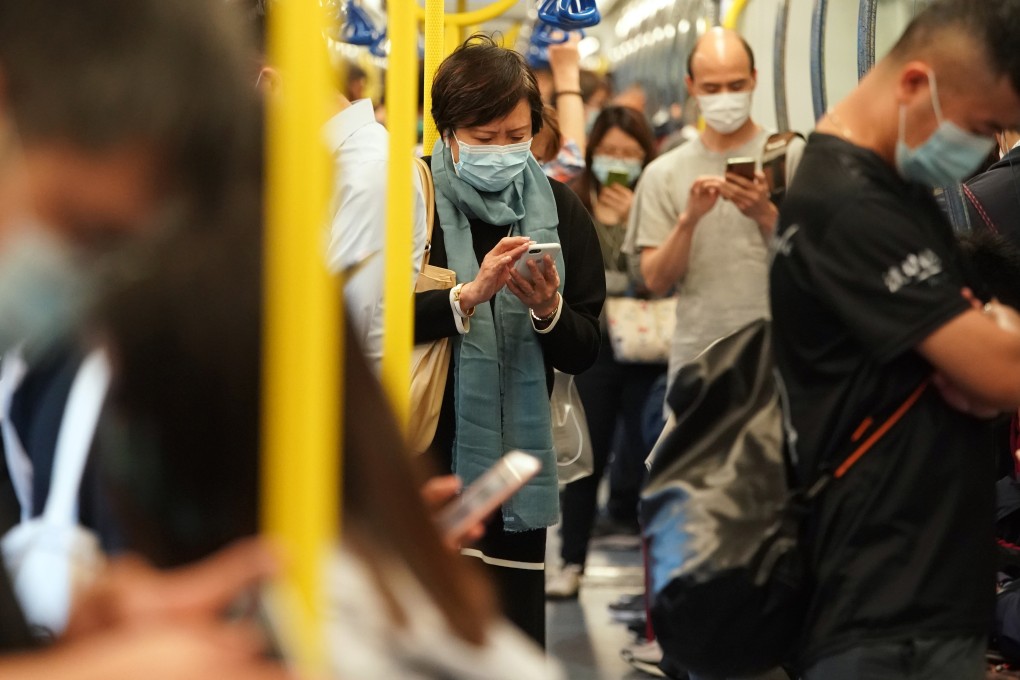 Apple’s flagship iPhones have dispensed with the Touch ID fingerprint sensor in favor of Face ID, requiring users wearing masks to put in a passcode every time they want to unlock their phone. (Picture: Felix Wong/SCMP)