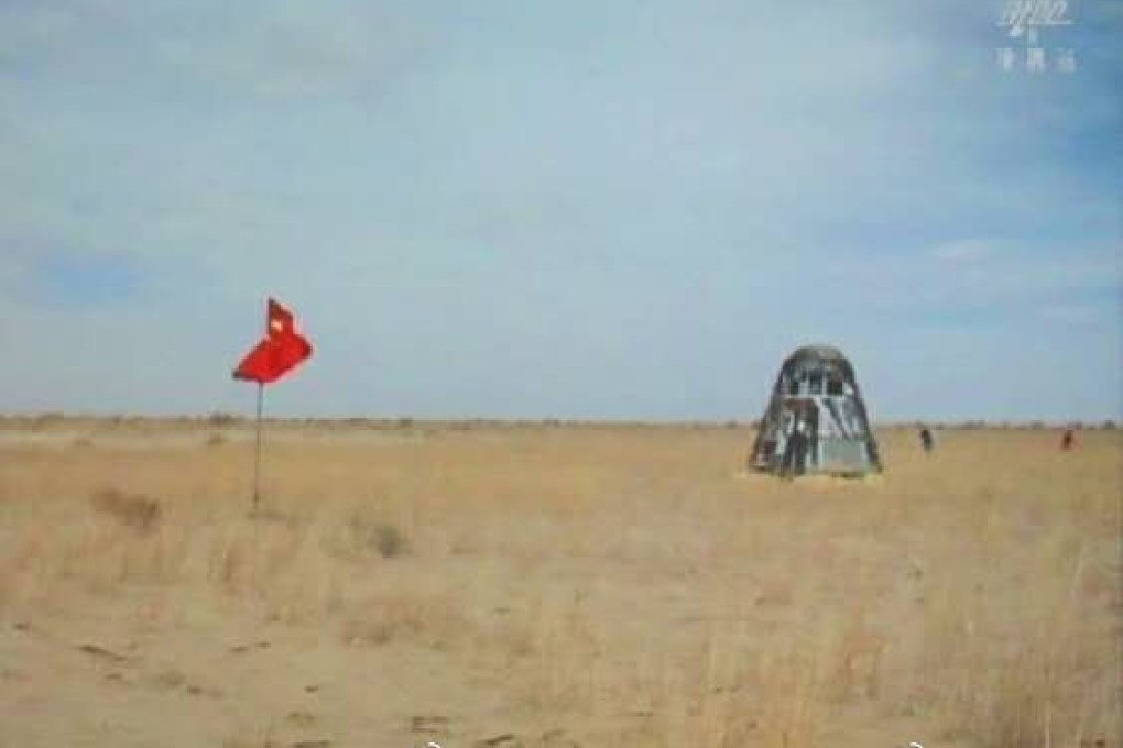China’s new manned spacecraft prototype successfully returns to Earth