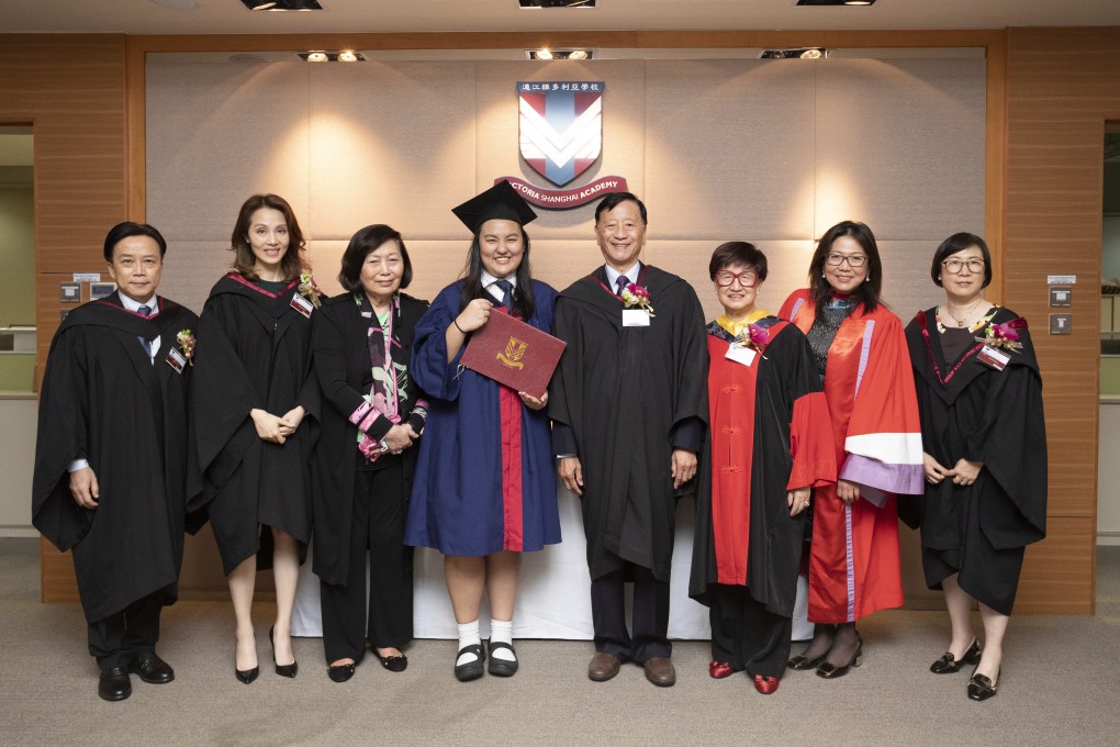 VSA Board of Directors presenting Emma Wong (centre) an Outstanding Alumni Scholarship for her further studies at Stanford University.