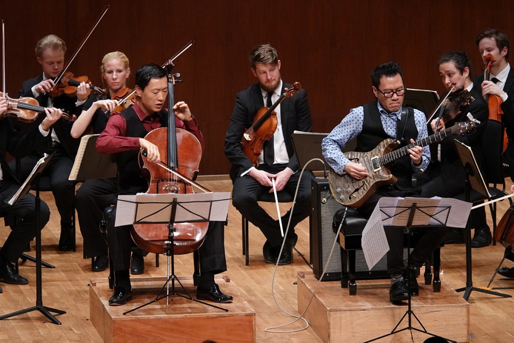 Trey Lee and leading guitarist Eugene Pao at the world premiere of Lee’s rearrangement of Piazzolla’s The Four Seasons of Buenos Aires at Musicus Fest 2018.