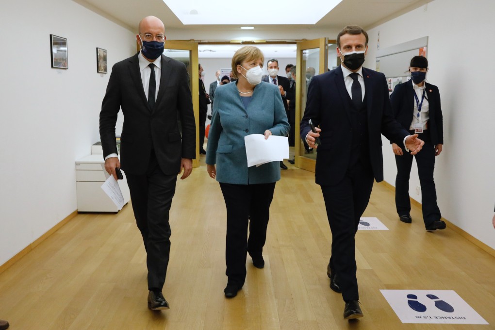 European Council President Charles Michel, German Chancellor Angela Merkel and French President Emmanuel Macron talk before an EU summit in Brussels, Belgium, on December 10. Photo: European Union via Xinhua