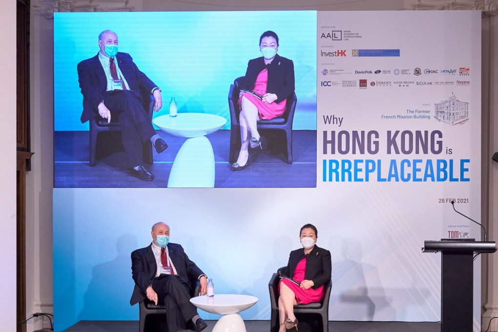 Anthony Neoh, Chairman of the Asian Academy of International Law, with Teresa Cheng, Secretary for Justice of the Hong Kong SAR.