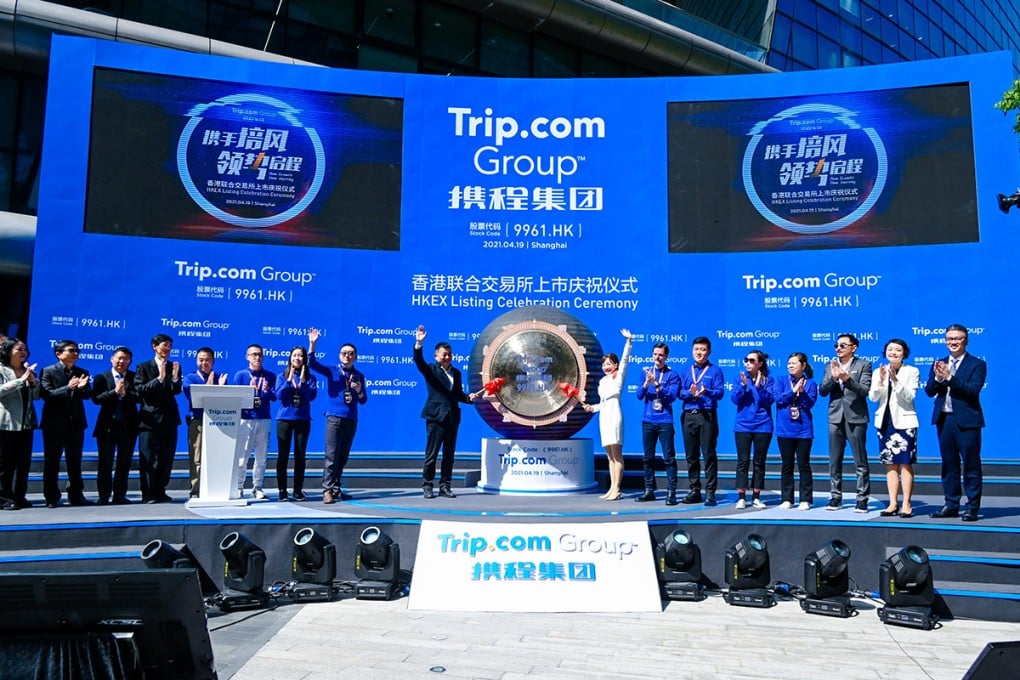 Trip.com Group Chairman James Liang and CEO Jane Sun celebrating the Group’s secondary listing on the HKEX in April 2021.