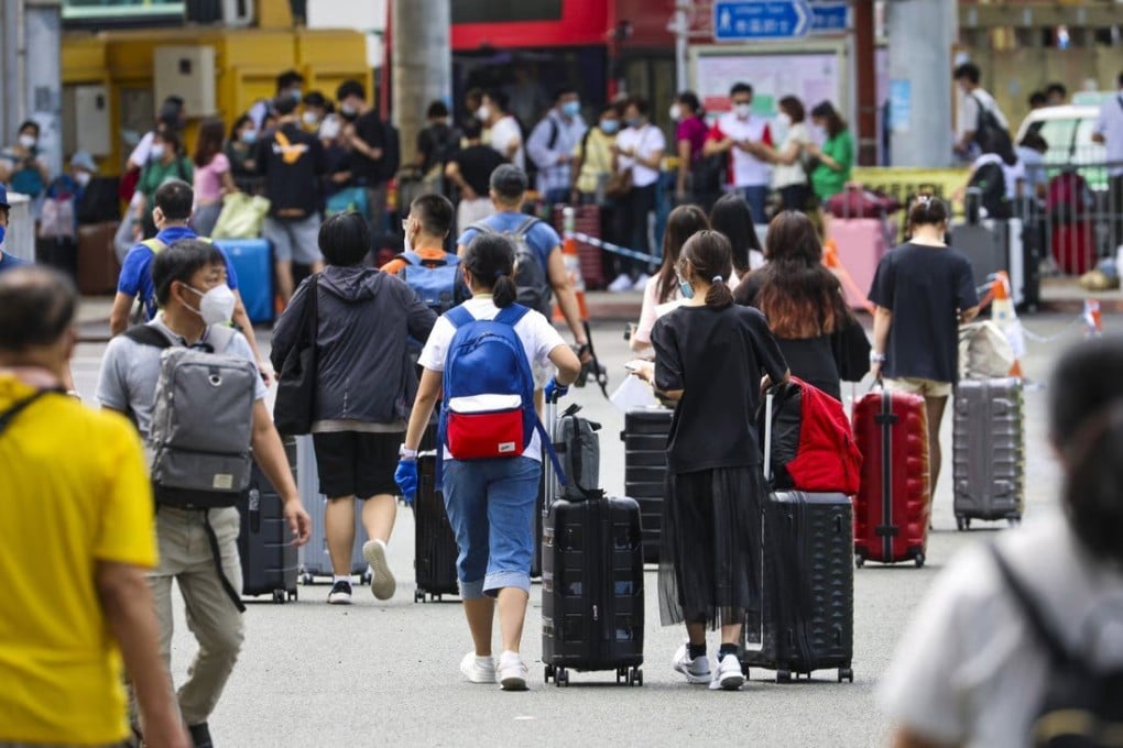 Travellers line up for Covid-19 PCR tests at Shenzhen Bay Port in Hong Kong. Photo: Dickson Lee