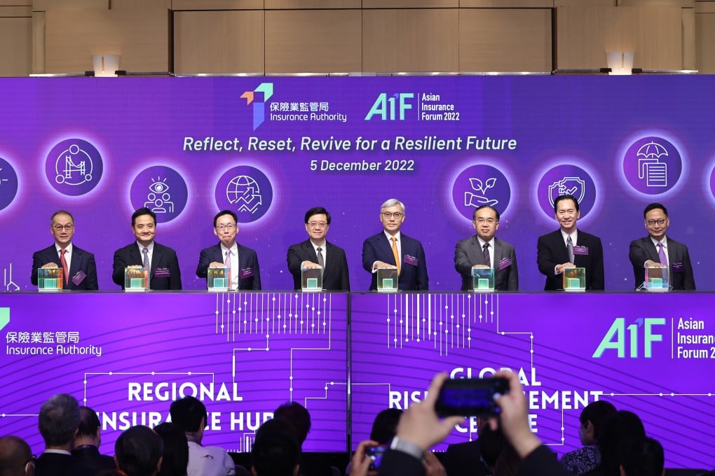 Officiating guests at the opening ceremony of the AIF 2022 (from left): Kwok Kwok-chuen, Chief Executive Officer, Hong Kong Academy of Finance; Dr Stephen Wong, Member of Legislative Council (Election Committee) of the HKSAR; Chan Kin-por, Non-Official Member of Executive Council of the HKSAR; John Lee, Chief Executive of the HKSAR; Stephen Yiu, Chairman of the IA; Christopher Hui, Secretary for Financial Services and the Treasury of the HKSAR; Bernard Charnwut Chan, Hong Kong Deputy to the National People’s Congress of the People’s Republic of China; and Clement Cheung, Chief Executive Officer of the IA.