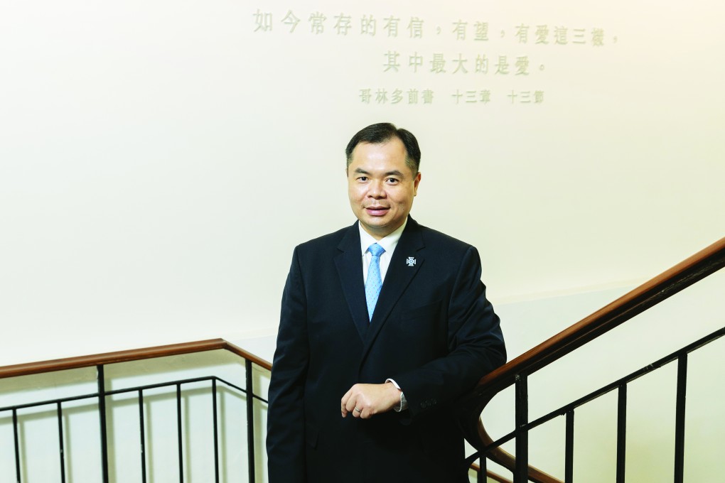 Standing in the century-old heritage building, Poon regards the school motto "faith, hope and love" as crucial words to help nurture students to become future leaders.
