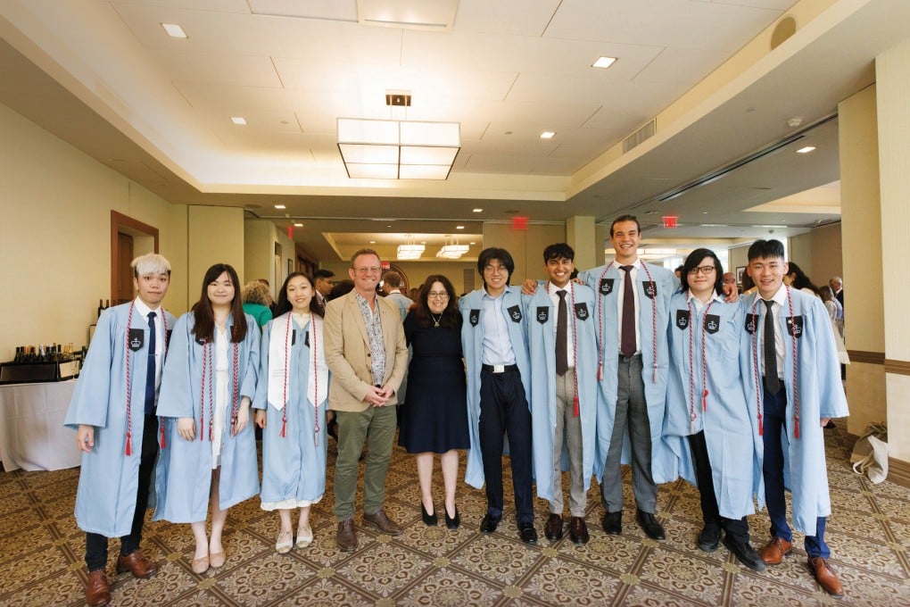 Prof Richard M Walker, Dean of CLASS (fourth from left), greeted the Joint Bachelor’s Degree Program graduates after the Class Day ceremony.