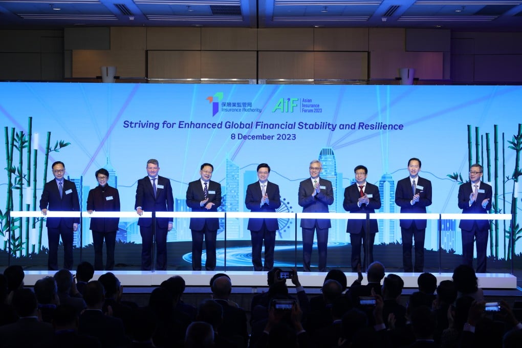 Officiating guests at the opening ceremony of AIF 2023: (from left) Mr Clement Cheung, Chief Executive Officer of the Insurance Authority (IA); Professor Christine Loh, Chief Development Strategist of Institute for the Environment of the Hong Kong University of Science and Technology; Mr Jonathan Dixon, Secretary General of the International Association of Insurance Supervisors (IAIS); Mr Yin Zonghua, Deputy Director of the Liaison Office of the Central People’s Government in the HKSAR; Mr John Lee, Chief Executive of the HKSAR; Mr Stephen Yiu, Chairman of the IA; Mr Pei Guang, Director-General of the National Financial Regulatory Administration Guangdong Office; Mr Bernard Chan, Former Convenor of the Non-Official Members of Executive Council of the HKSAR and Chairman of Asia Insurance Company Limited; and Dr Au King-lun, Executive Director of Financial Services Development Council.