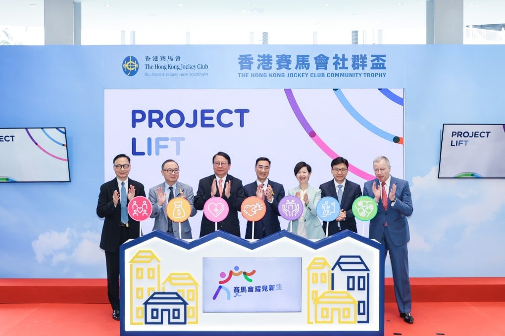 HKSAR Government Chief Secretary for Administration Chan Kwok-ki (3rd left), HKSAR Government Secretary for Housing Winnie Ho (3rd right), HKSAR Government Secretary for Labour and Welfare Chris Sun (2nd right), Club Chairman Michael Lee (centre), Club Deputy Chairman Martin Liao (2nd left), Club Chief Executive Officer Winfried Engelbrecht-Bresges (1st right) and JC PROJECT LIFT Advisory Committee Convenor Clement Cheung (1st left) officiate at the JC PROJECT LIFT announcement ceremony at The Hong Kong Jockey Club Community Day.