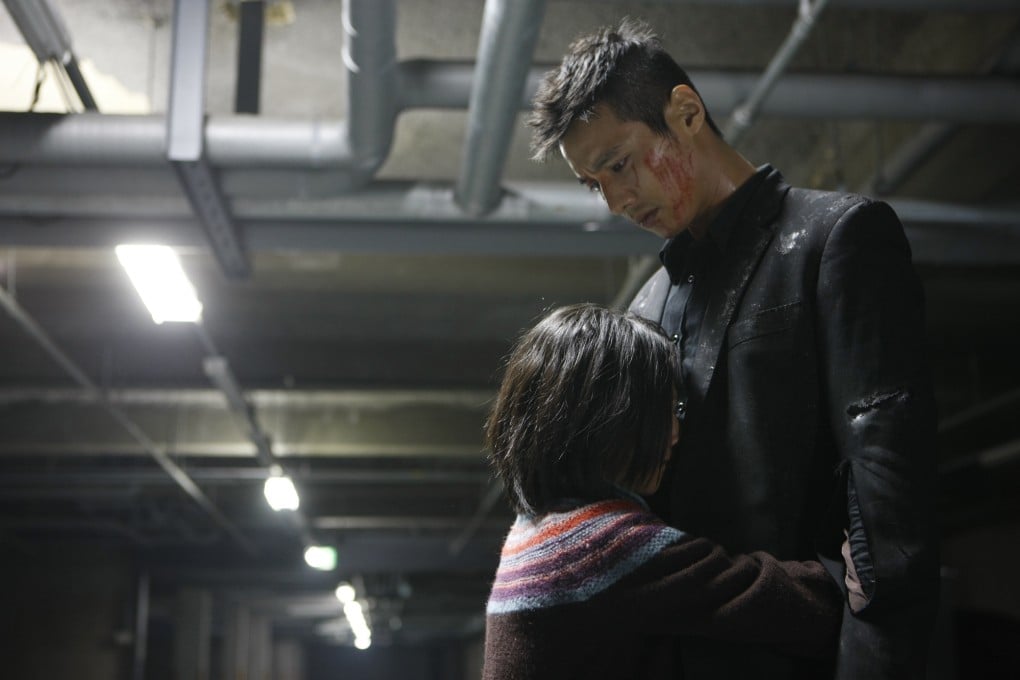 Kim Sae-ron and Won Bin (right) in a still from The Man From Nowhere.