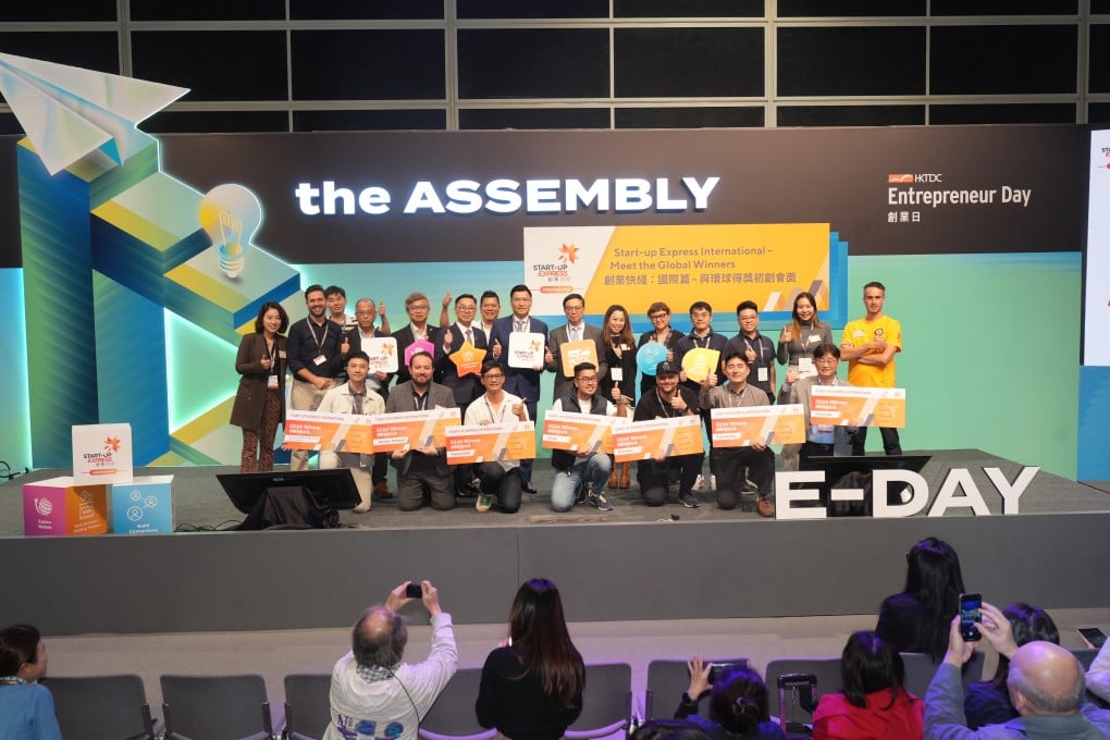The global winners of Start-up Express International 2024 pose with their awards at Entrepreneur Day (E-Day) in Hong Kong, joined by industry leaders and organisers.