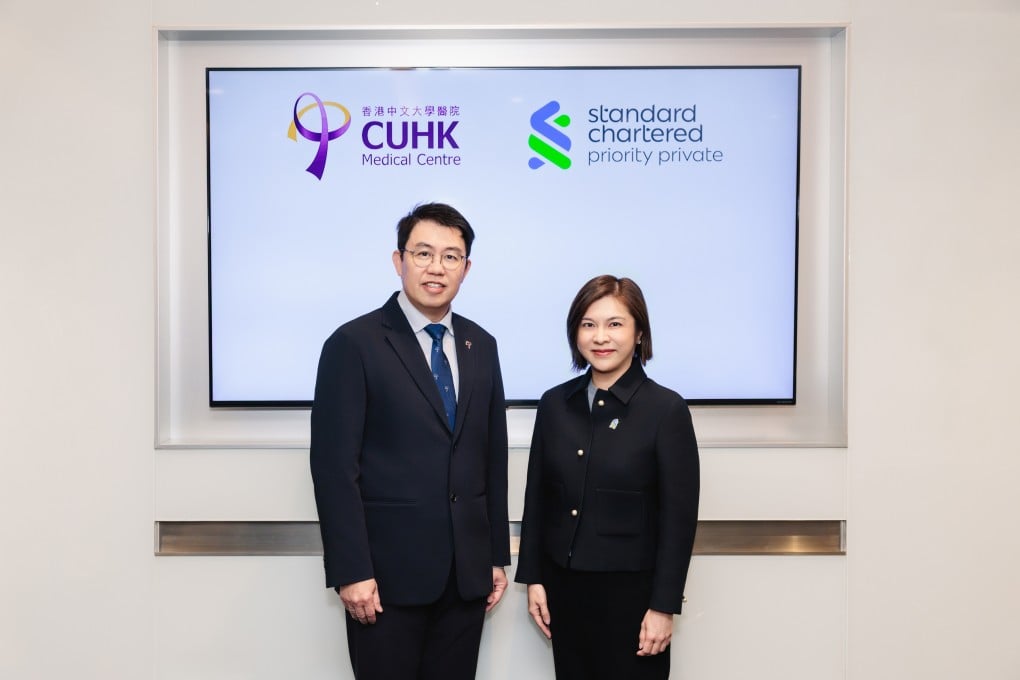 Eliza Law, Head of Affluent Segment & Distribution, Standard Chartered Hong Kong (right); Dr Chung Kin Lai, CEO of CUHK Medical Centre.