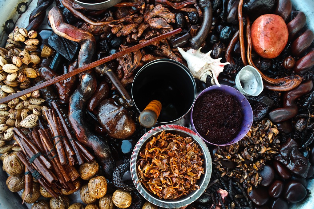 A selection of traditional herbs from India used in Ayurvedic medicine therapies. Ayurveda treats the body, mind and spirit as one, on the basis that they are connected to the outer world and work together to prevent disease. Photo: Getty Images