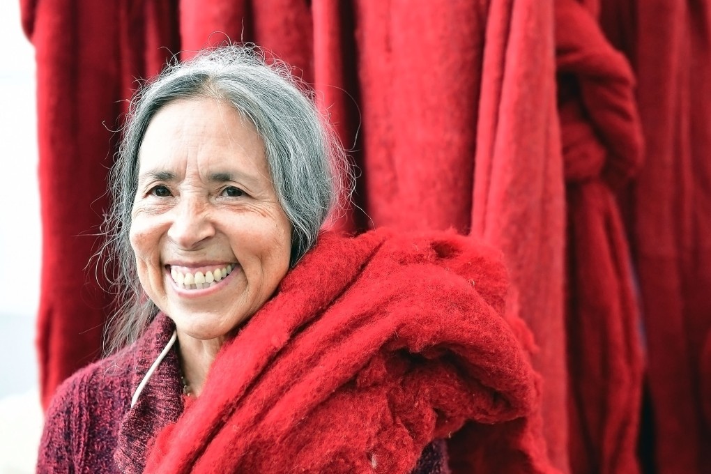 Chilean artist Cecilia Vicuna with one of her works at the Documenta 14 art show in Kassel, Germany, on June 8, 2017. Photo: Getty Images