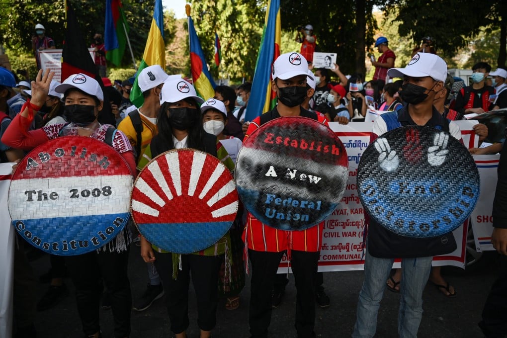 Representatives from the Karen ethnic group take part in a demonstration against the military coup, in Yangon, on February 11. Photo: AFP