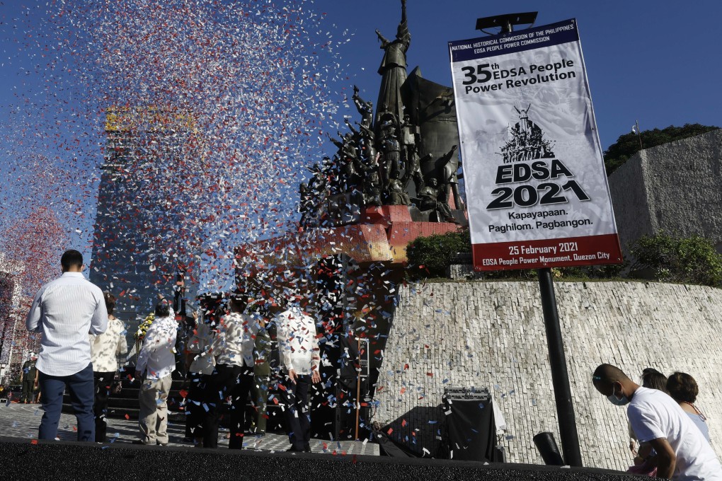 Confetti is showered from above during a ceremony to mark the 35th anniversary of the People Power Revolution at the People Power Monument in Quezon City Philippines, on February 25. Photo: EPA-EFE