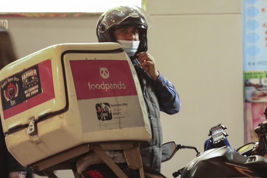 A South Asian delivery driver at work in Causeway Bay on January 22. Photo: Martin Chan