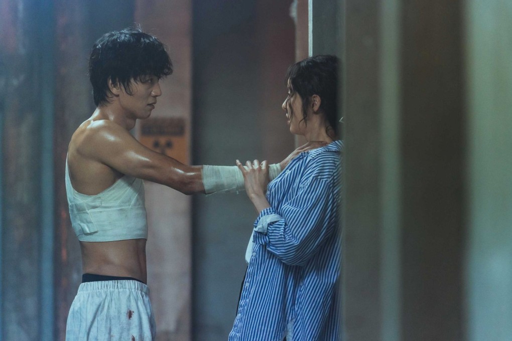 Kim Rae-won (left) and Lee Da-hee in a still from L. U. C. A.: The Beginning.