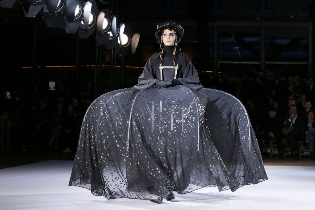 A model presents a creation by Japanese designer Yohji Yamamoto during Paris Fashion Week, in March 2015. Photo: Reuters