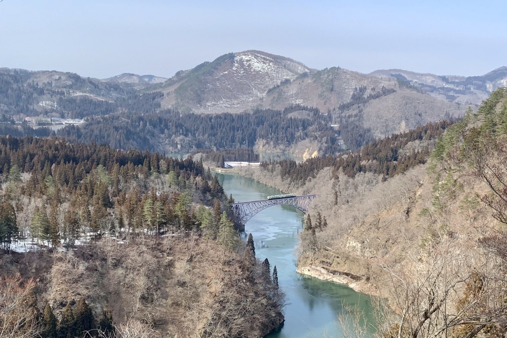 A train runs over the No 1 Tadami River Bridge in the countryside of Fukushima, Japan. Photo: Lee Cobaj