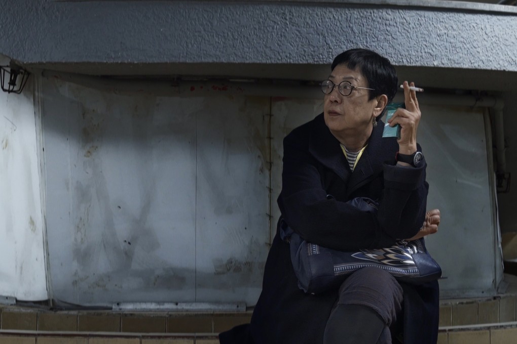 Hong Kong film director Ann Hui in a still from Keep Rolling (category IIB; Cantonese, Mandarin), a documentary feature directed by Man Lim-chung about her life and work.