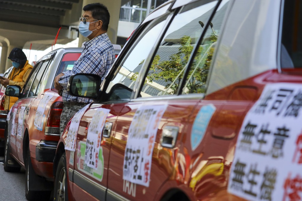 Taxi drivers petition for more cash subsidies outside the government’s headquarters last December, after being left out in the previous round of relief measures. Photo: Dickson Lee