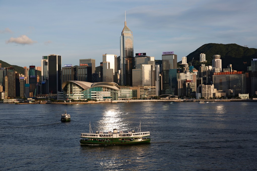 A Star Ferry boat crosses Victoria Harbour in front of a skyline of buildings in Hong Kong on June 29, 2020. Photo: Reuters