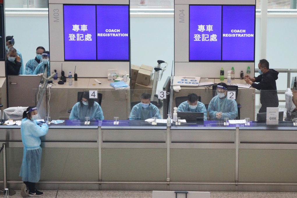 Coach registration counter at the Hong Kong International Airport, for passengers to be transported to designated quarantine hotels, on December 22. Photo: Nora Tam