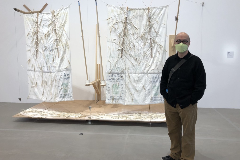 Artist and academic Kurt Chan Yuk-keung in front of Vertical Rye Field (2021), a recreation of a 1996 original that he had taken to show in the Second Asia Pacific Triennial of Contemporary Art, in Queensland, Australia. Photo: Enid Tsui