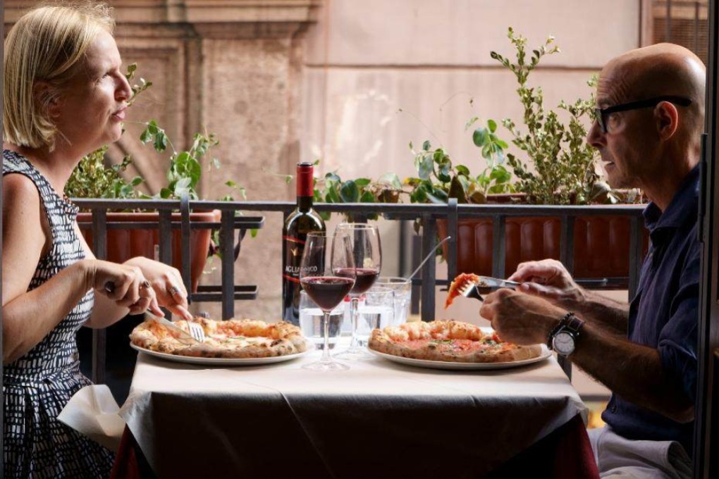 Stanley Tucci (right) speaks with professor Elisabetta Moro in Naples about the history of pizza in CNN’s six-part travelogue series Stanley Tucci: Searching for Italy. Photo: CNN