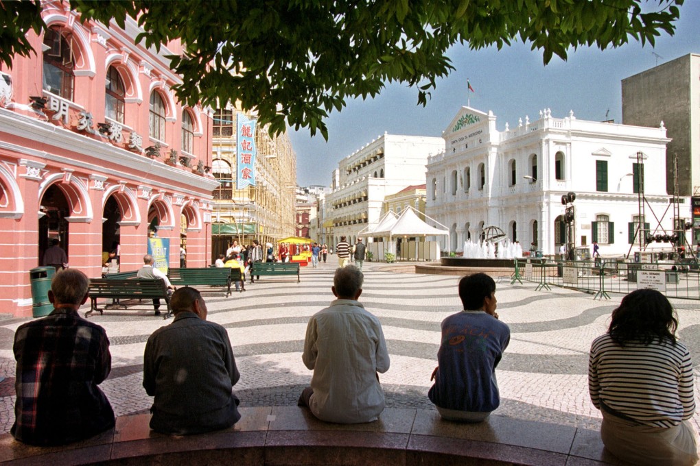 Residents of Macau spend a leisurely afternoon in Senado Square. Photo: AP