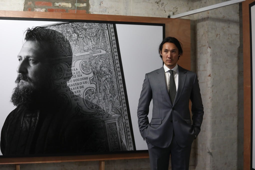 Curators of Tai Kwun exhibition “Way of the Sword: Warrior Traditions in China and Italy” Hing Chao (right) and Roberto Gotti. Photo: SCMP / Jonathan Wong