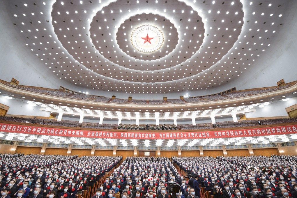 China marks its accomplishments in poverty alleviation and honours its poverty fighters at the Great Hall of the People in Beijing, on February 25. Photo: Xinhua