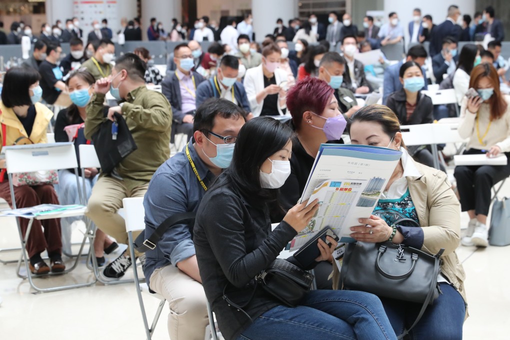 Buyers lining up at the sales office of Grand Victoria development at Olympian City in Tai Kok Tsui on March 13, 2021. Photo: Edmond So