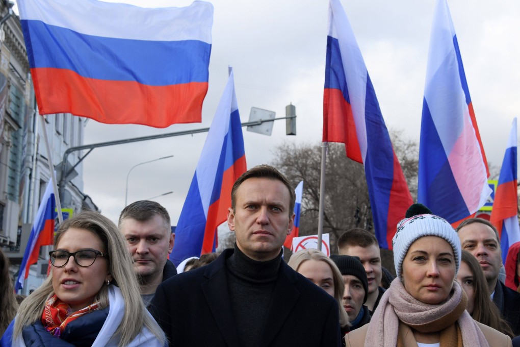 Russian opposition leader Alexei Navalny (centre) marches in Moscow on February 29, 2020. Bellingcat was part of a joint investigation into Navalny’s poisoning. Photo: AFP