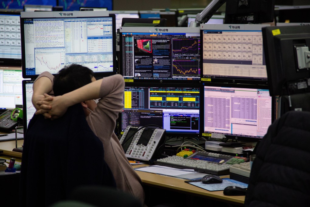 Local stocks took a hit on Friday as a spike in Covid-19 cases from a gym cluser. Photo: EPA-EFE