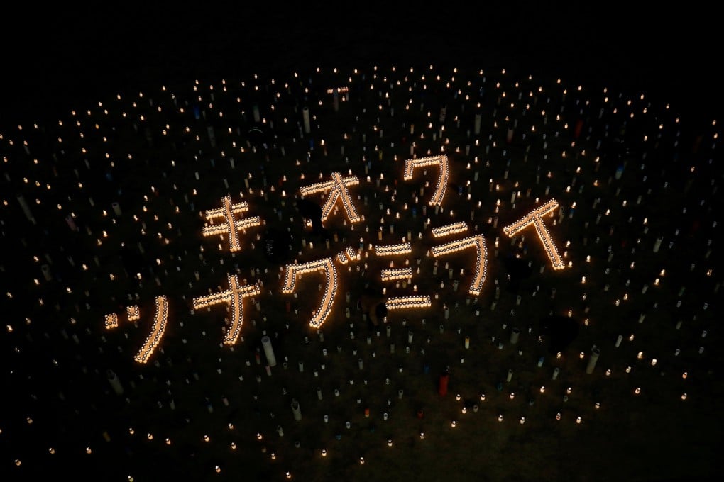 Candles reading “Memory, connect to future” mark the 10th anniversary of the 2011 earthquake and tsunami that killed thousands and triggered the worst nuclear accident since Chernobyl, in Futaba, Fukushima prefecture, Japan, on March 11. Photo: Reuters