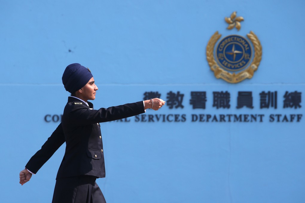 Sukhdeep Kaur, the first Sikh female prison officer to wear a turban in Hong Kong, marches in lockstep at the Hong Kong Correctional Services Department in Stanley on December 12, 2019. Attaining proficiency in the Chinese language has long been a challenge for members of Hong Kong’s ethnic minority communities. Photo: David Wong