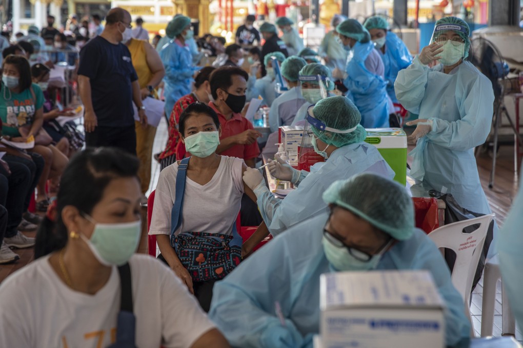 Health workers administer doses of a Covid-19 vaccine in Bangkok, Thailand. Photo: Bloomberg