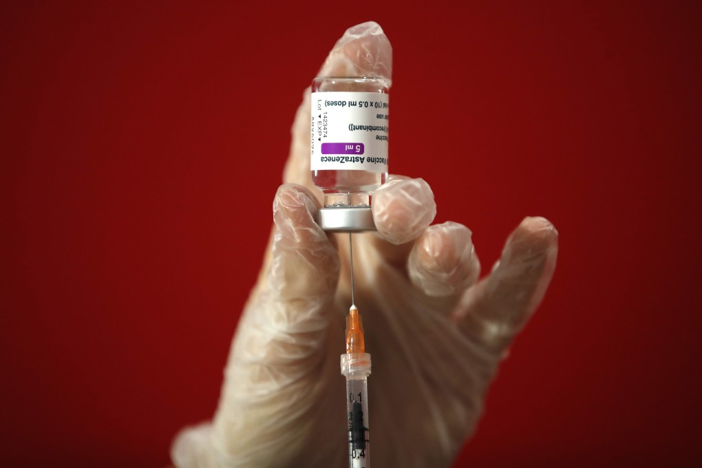 A health worker prepares a dose of the AstraZeneca vaccine to be administered to a patient at a vaccination centre in Italy. Photo: AP