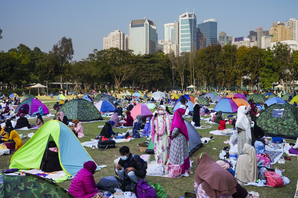 Hong Kong’s domestic workers enjoy their day off in Victoria Park last December. A vaccination tent would help medical staff reach out to this population, some of whom may find it difficult to book a vaccine online. Photo: Sam Tsang