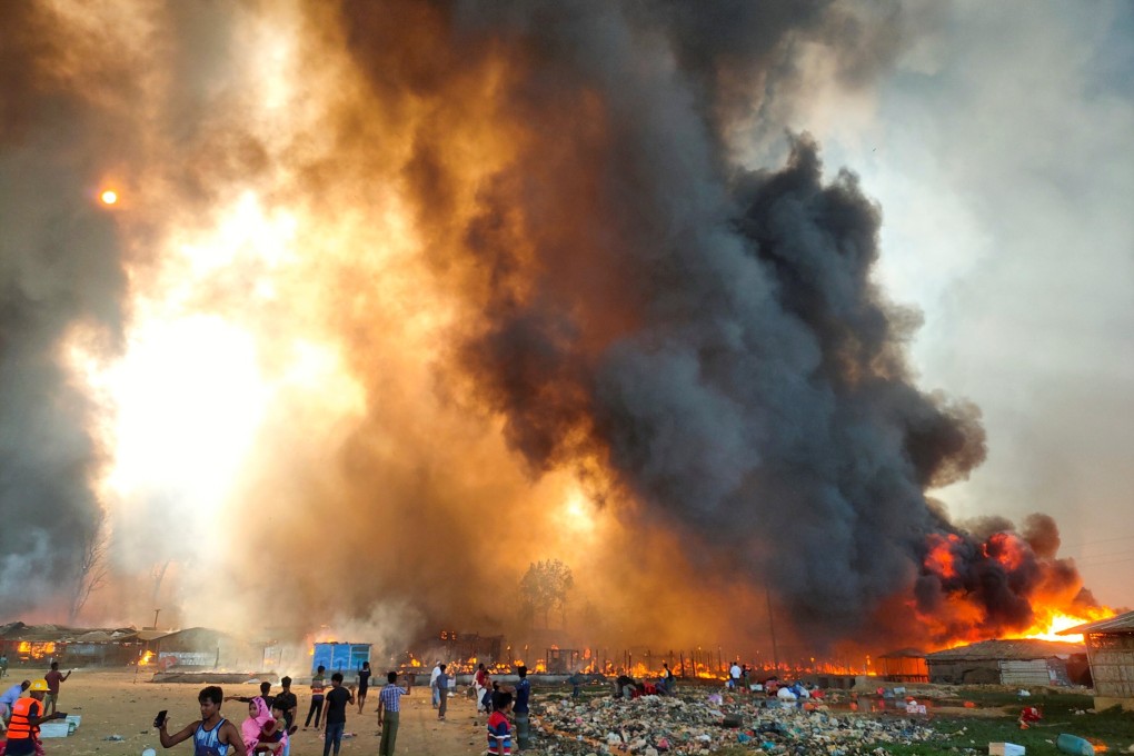 Smoke billows at the site of the Rohingya refugee camp in Cox’s Bazar, Bangladesh on Monday. Photo: Reuters
