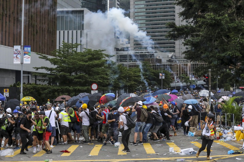 Police fire tear gas at protesters on June 12, 2019. Photo: K. Y. Cheng