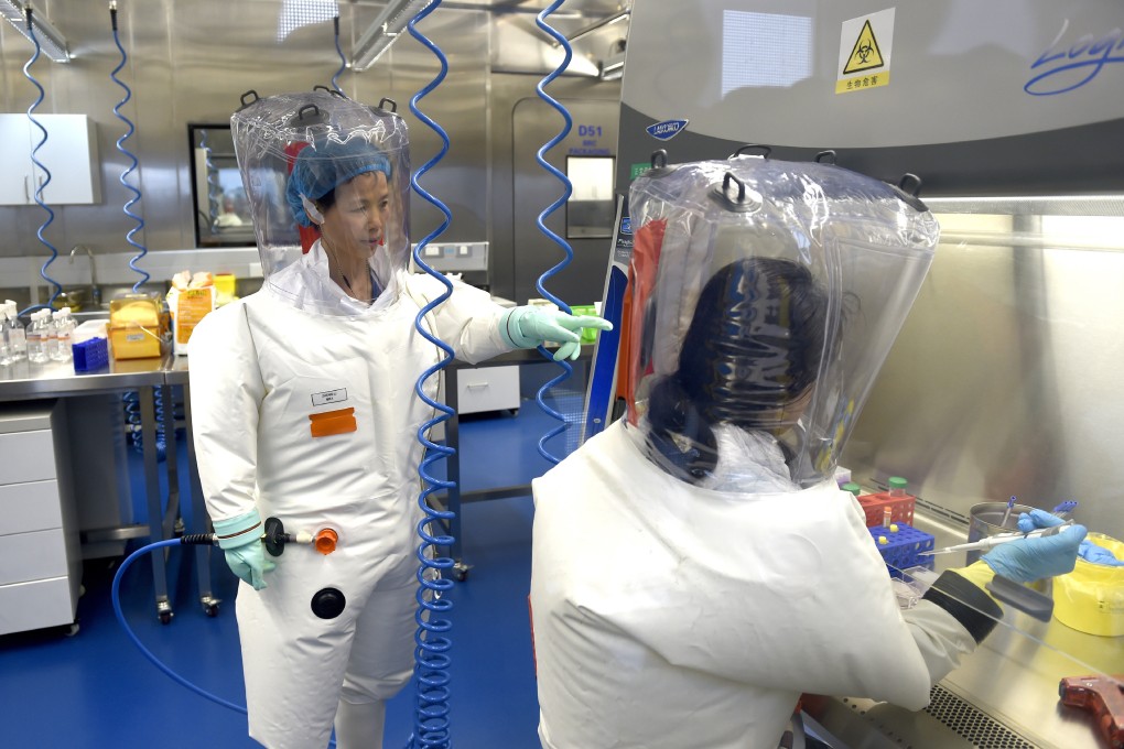 Researchers work in a lab at the Wuhan Institute of Virology, in Wuhan in central China’s Hubei province. Photo: AP