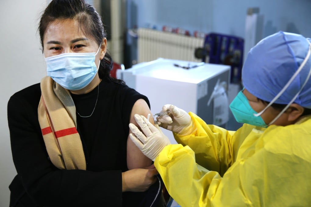 A woman receives a vaccination at a centre in Beijing, in China, on January 8. Photo: Getty Images
