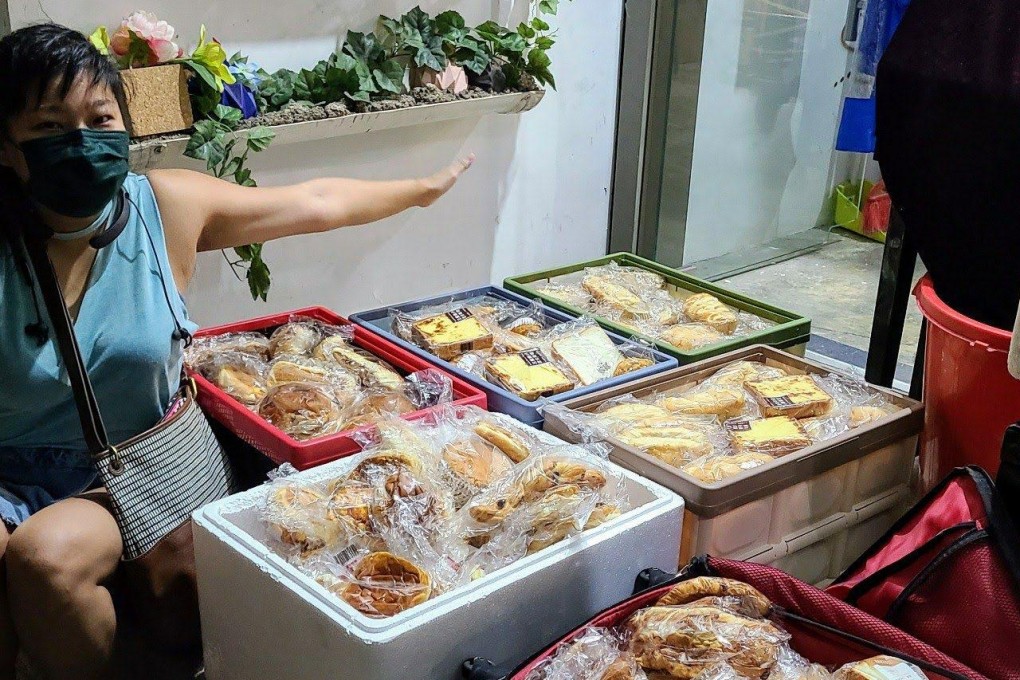 A volunteer from Breadline with unsold food for delivery to charities helping needy families in Hong Kong. Food rescue apps are a recent addition to the fight against food waste, and one has begun operating in the city. Photo: Breadline
