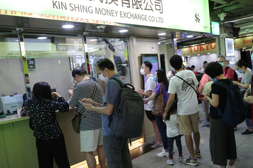 People queue to exchange Hong Kong dollars for foreign currencies at the Chungking Mansions in Tsim Sha Tsui, Hong Kong on May 29, 2020. Photo: Edmond So