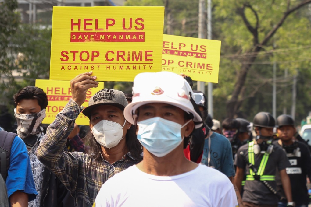 Protesters march in Mandalay on March 25, 2021. At least 286 people have been killed since the military launched a coup on February 1. Photo: EPA-EFE