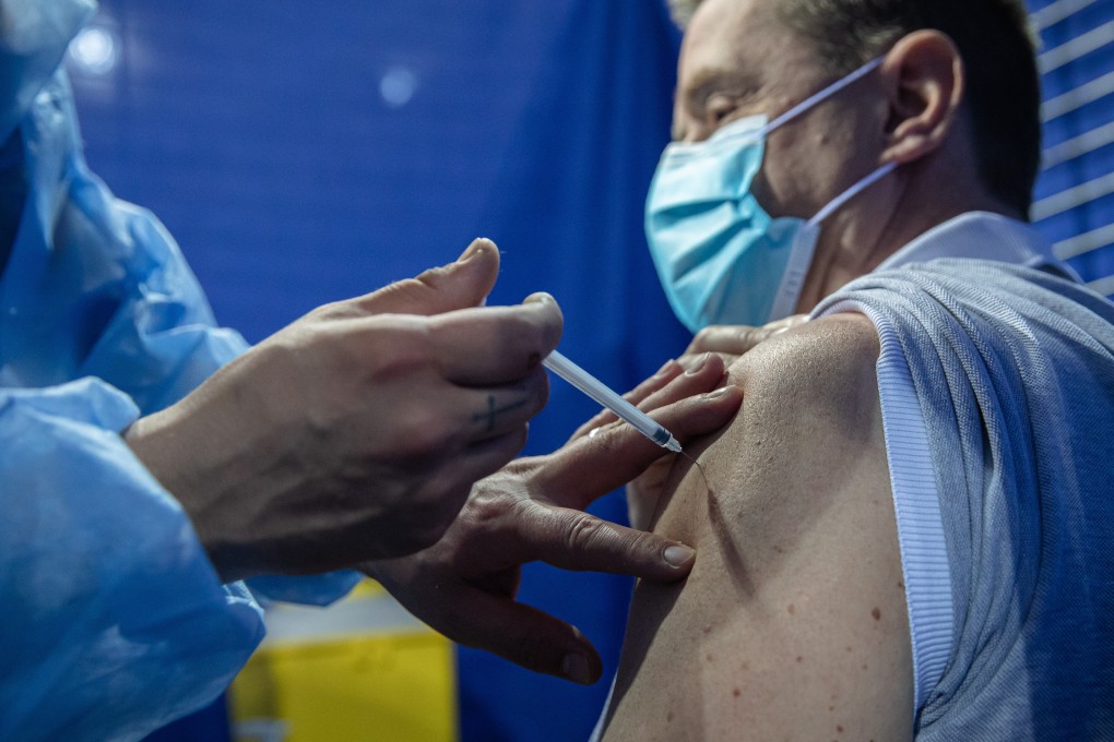 A man receives a Covid-19 vaccine shot in France. Photo: Xinhua