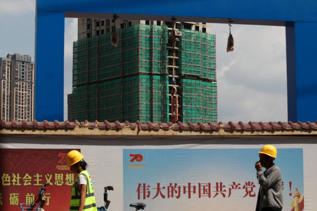 A Country Garden project site in Kunming, in China’s Yunnan province. The company hopes to lower its debt to below 300 billion yuan this year, its president and executive director says. Photo: Reuters